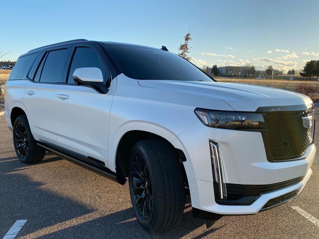 white 2021 Cadillac Escalade Llumar window tinting front side view