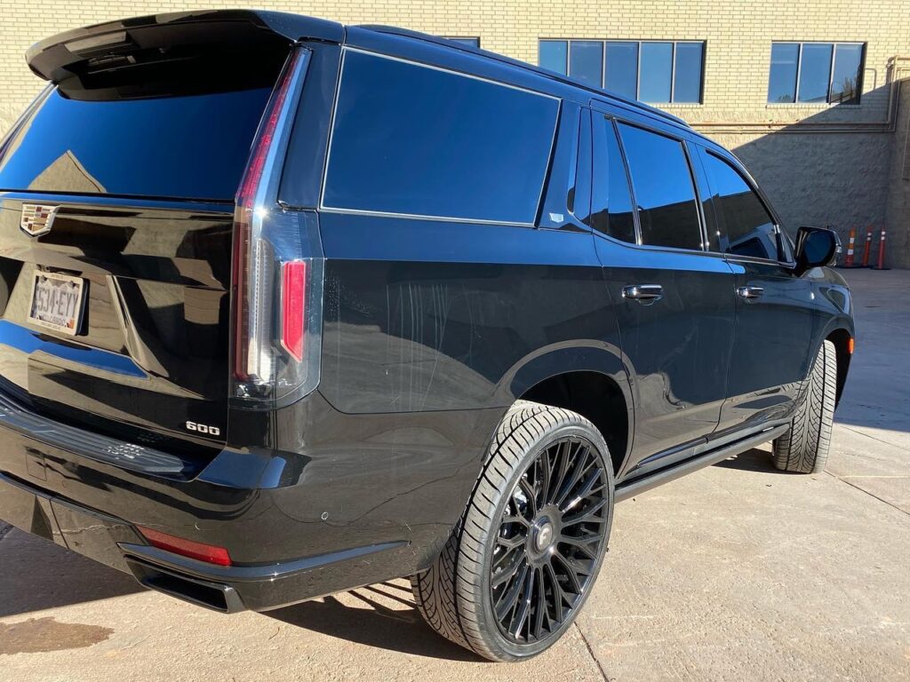 blacked out Cadillac Escalade