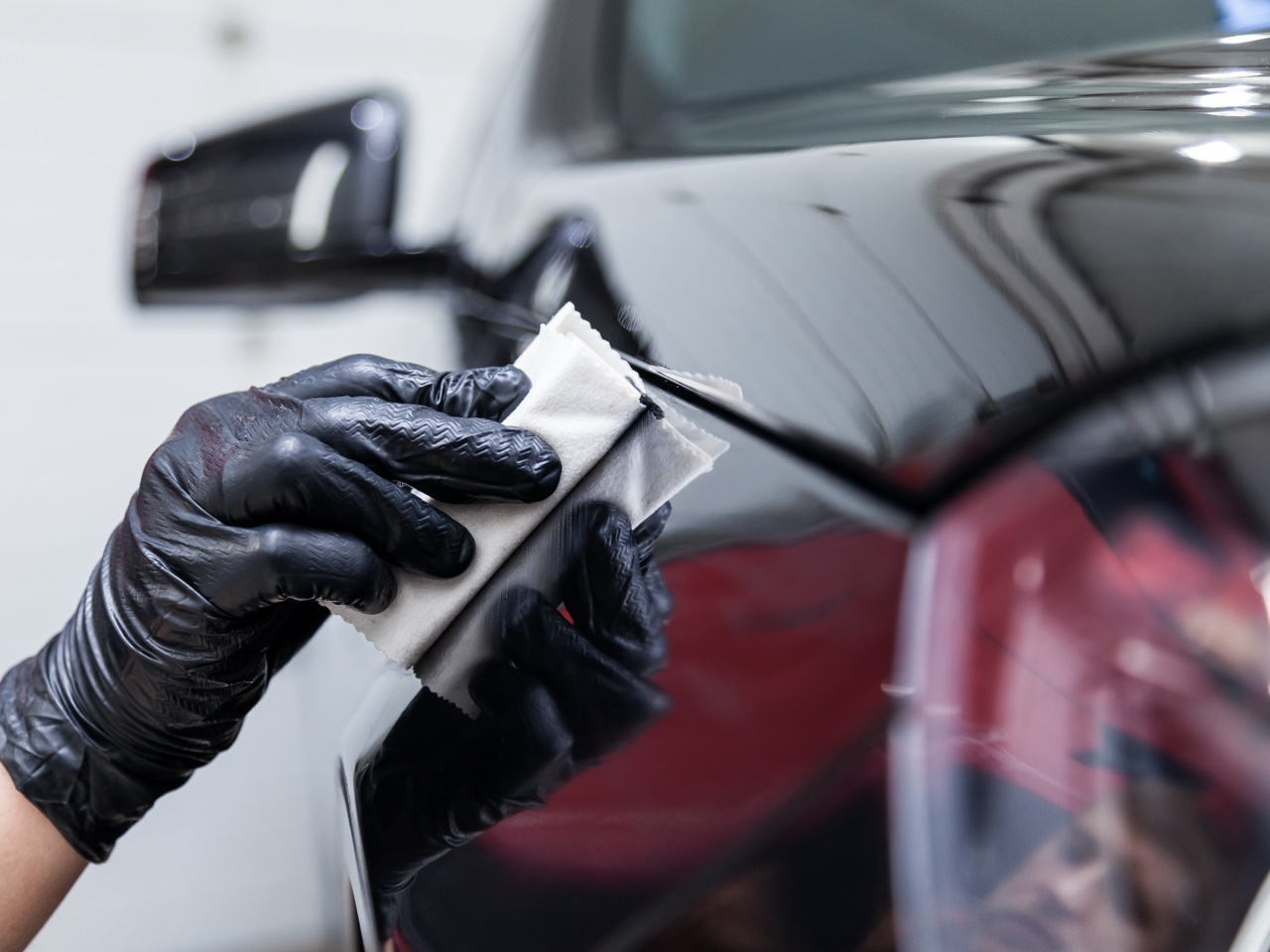 applying ceramic coating to a black car
